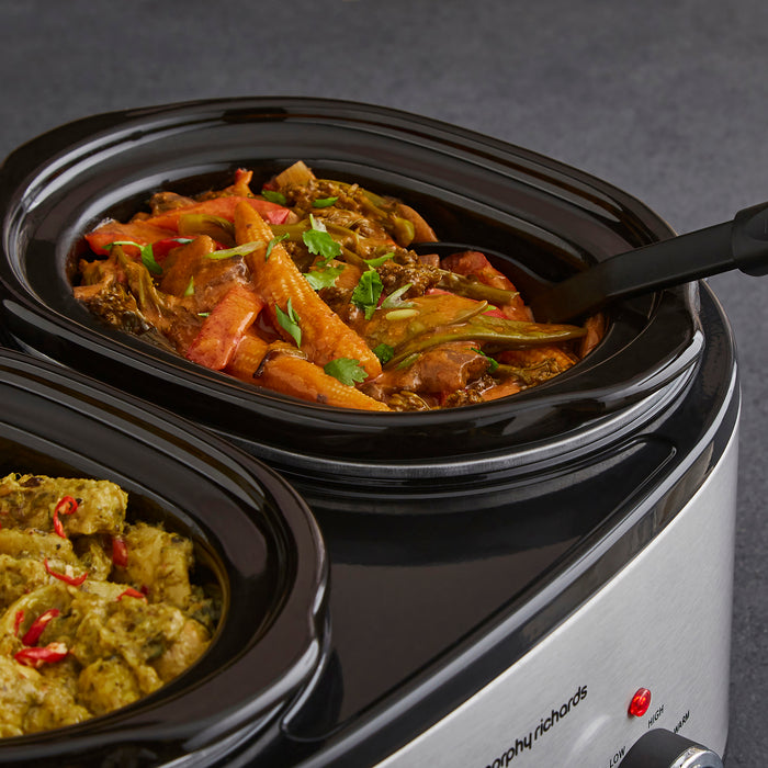 solid spoon in slow cooker pot