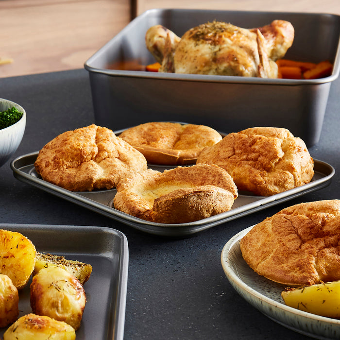 4 Cup Yorkshire Pudding Tray with a roast chicken and roast potatoes