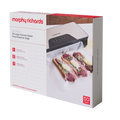 A box of Morphy Richards 50x Large Vacuum Sealer Bags, with an image of the bags on a countertop next to a vacuum sealer machine, preserving food.