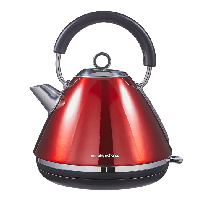 Red electric kettle with black handle on a white background