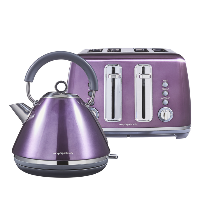 Purple kettle and toaster set on a white background