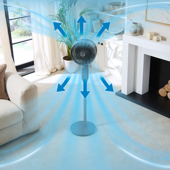 Stand fan in a living room with air flow arrows indicating direction