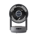 A black oscillating desktop fan with a remote control, featuring a circular design with three blades, a touch panel control on the front, and a stable base.