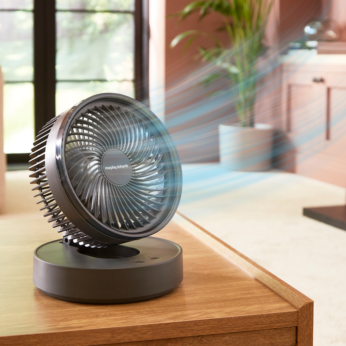Air Flex 6” Portable Oscillating Rechargeable USB Fan on a coffee table