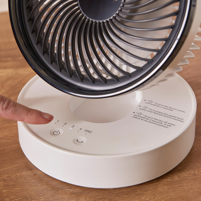 Pressing the on button to the Air Flex 6” Portable Oscillating Rechargeable USB Fan