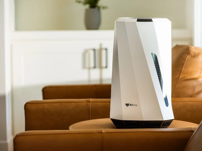 Airdog Air purifier on a coffee table in a living room setting