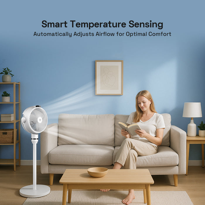Woman reading a book on a couch with an Airdog smart temperature sensing fan in a living room.