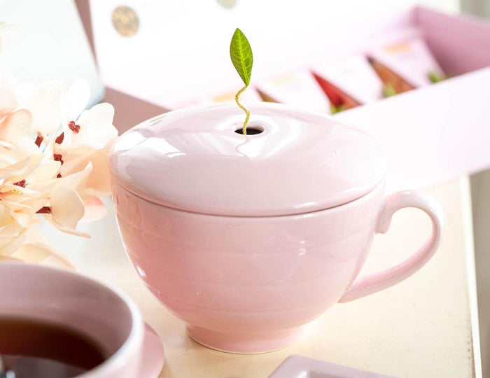 MAIN PDP | Café Cup porcelain tea cup in pink on table
