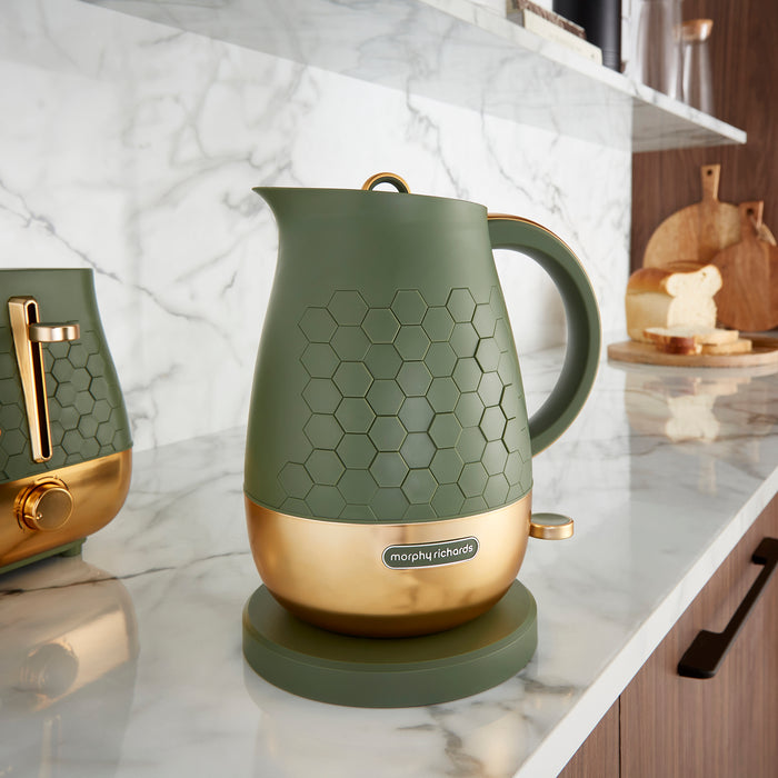 green jug kettle in kitchen matching toaster in the background