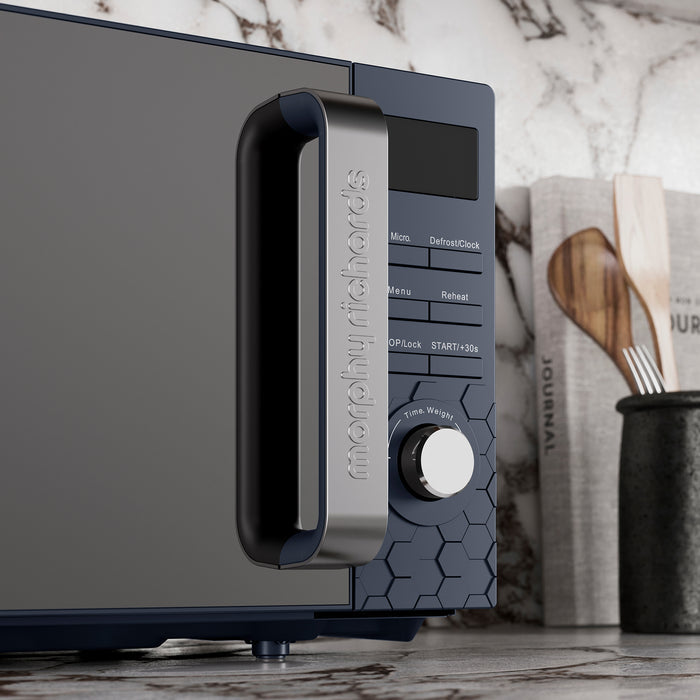 Morphy Richards microwave on a marble countertop with kitchen items in the background