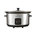 A Morphy Richards stainless steel 6.5L slow cooker with a black glass lid and brushed stainless steel body, featuring a control knob on the front.