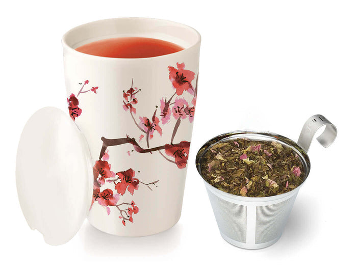 Cherry Blossom KATI Steeping Cup with tea inside and infuser to the side with loose tea leaves in it