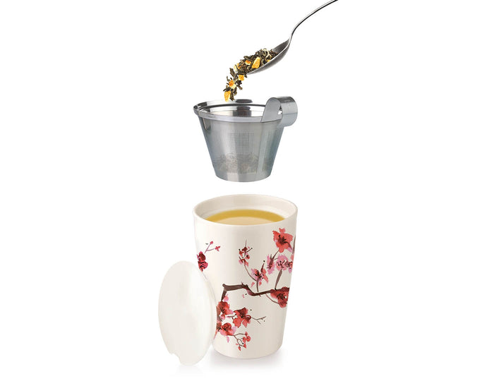 Cherry Blossom design KATI® Steeping cup with infuser showing stainless steel infuser with tea leaves