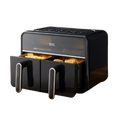 A black digital dual basket 7.2 litre air fryer with food inside, showing both drawers open.