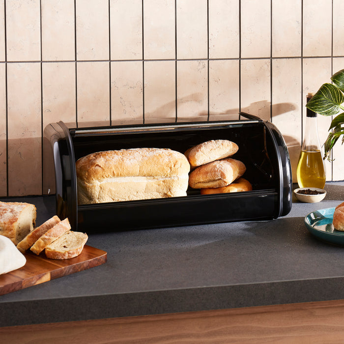 Morphy Richards bread bin on a kitchen counter with bread and butter