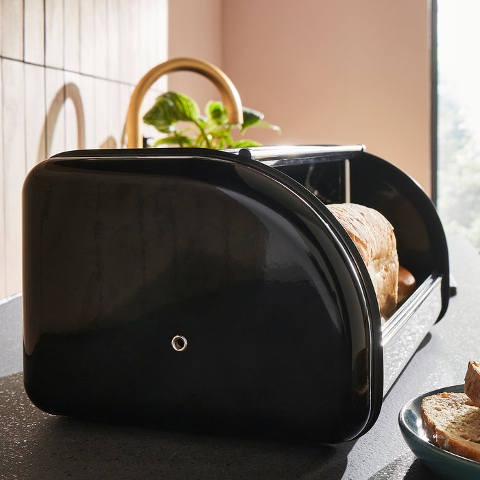 Morphy Richards bread bin on a kitchen counter with bread and butter