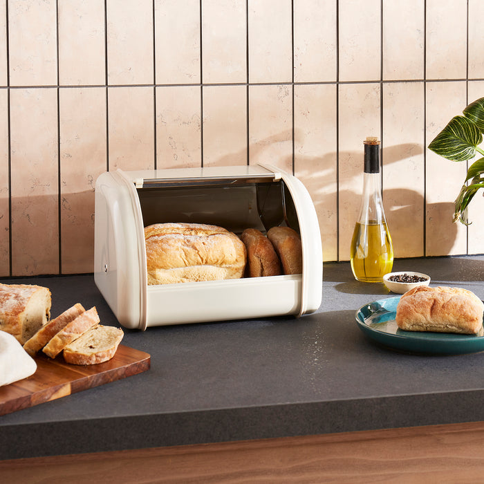 Morphy Richards bread bin on a kitchen counter with bread and butter