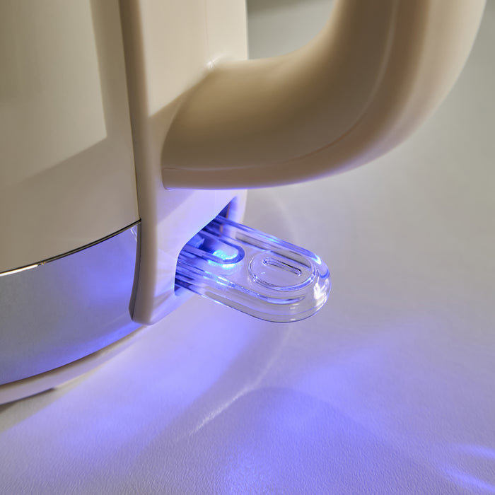 Close-up of a white electronic kettle with a blue light on a white background