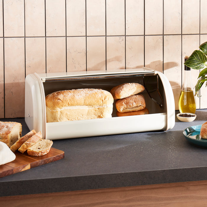 Morphy Richards bread bin on a kitchen counter with bread and butter