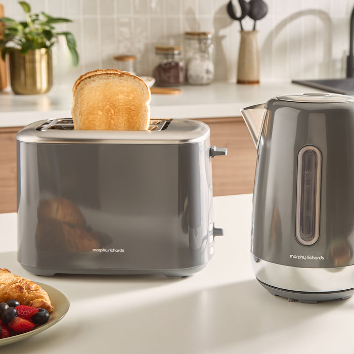 Grey kettle and toaster set on a kitchen counter.