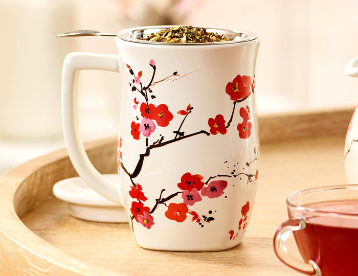 MAIN PDP | Fiore Sakura Steeping Cup with lid off and loose leaf tea inside the infuser