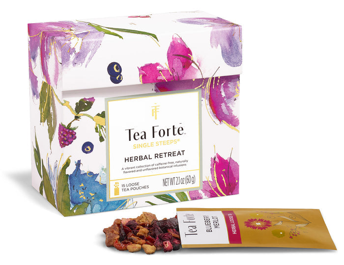 Tea Forte Herbal Retreat Single Steeps Sampler box, closed, with loose tea pouch, open, on a white background