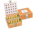 Herbal tea assortment in a 40 count tea chest of infusers with lid open and closed