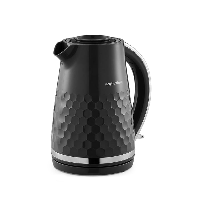 Black electric kettle with honeycomb pattern on a white background