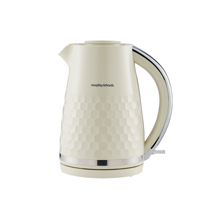 Cream-colored electric kettle with honeycomb pattern on a white background