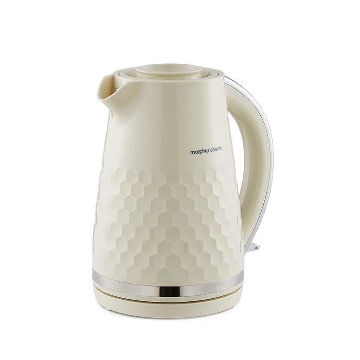 White electric kettle with honeycomb pattern on a white background