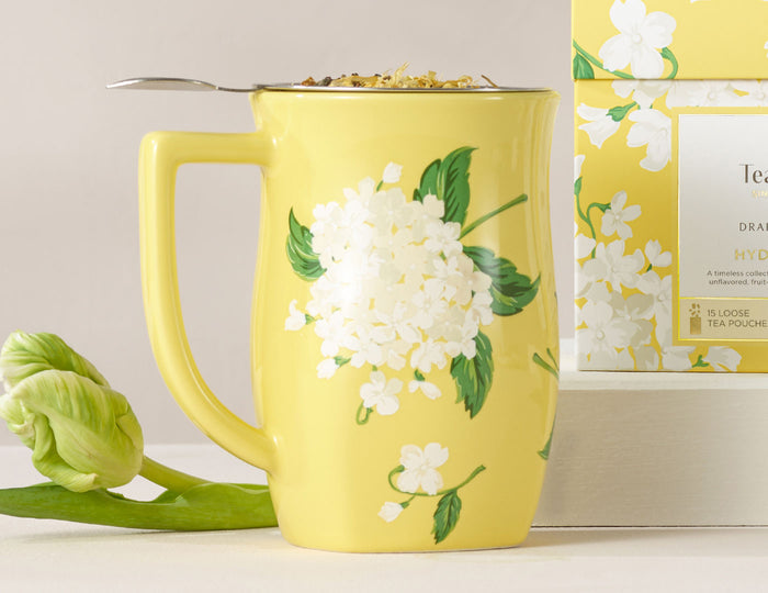 MAIN PDP | Hydrangea Fiore Steeping cup with lid off and loose tea inside with a tulip