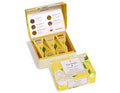 Yellow striped presentation box containing Tea Forte tea sachets and a yellow Hydrangea-themed box with white floral design.