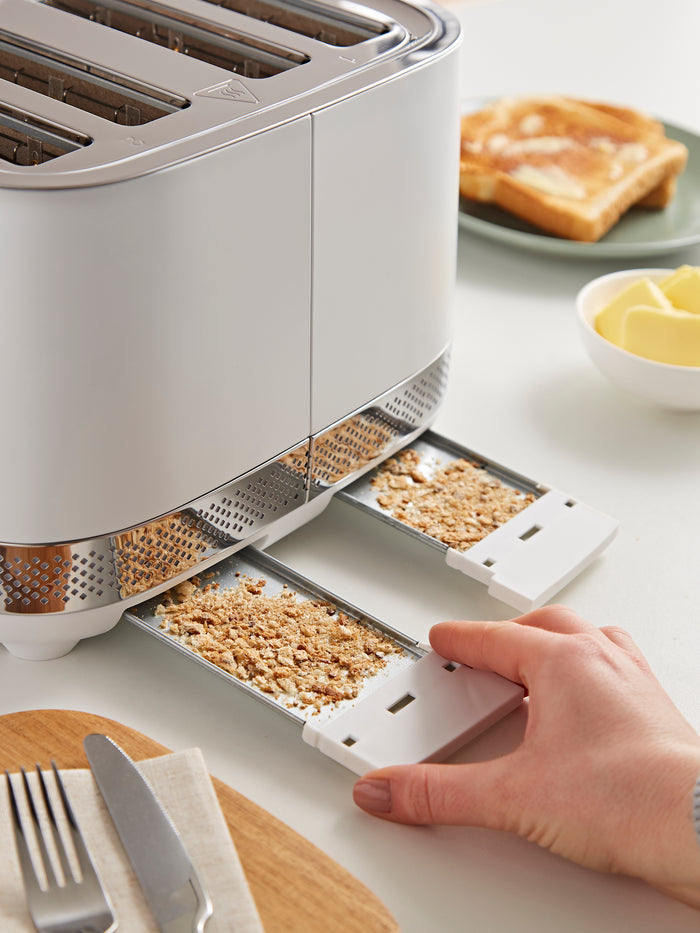 Toaster with multiple slots for toast, croutons, and other items on a kitchen counter.