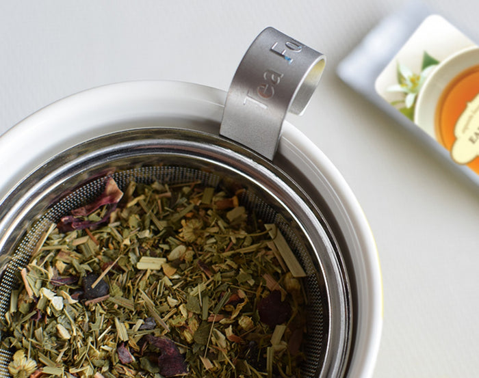 MAIN PDP | Stainless steel infuser replacement for KATI® steeping cup showing loose tea in stainless steel infuser