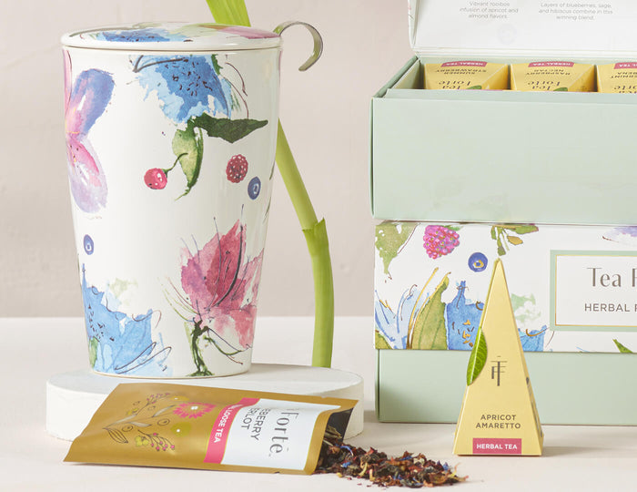 MAIN PDP | Herbal Retreat KATI® Steeping Cup with lid on and Single Steeps box next to it
