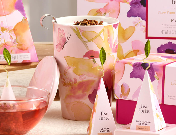 MAIN PDP | Mariposa Kati Steeping Cup & Infuser on table with tea and infusers