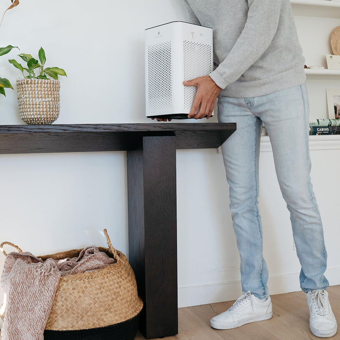 White rectangular ma-25 air purifier with perforated front panel for efficient indoor air cleaning