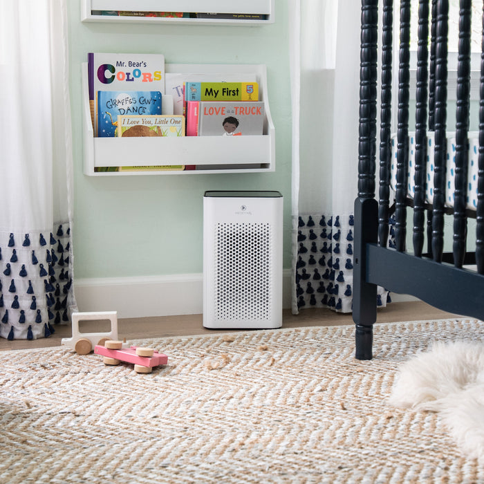 White rectangular ma-25 air purifier with perforated front panel and black trim for improved indoor air quality