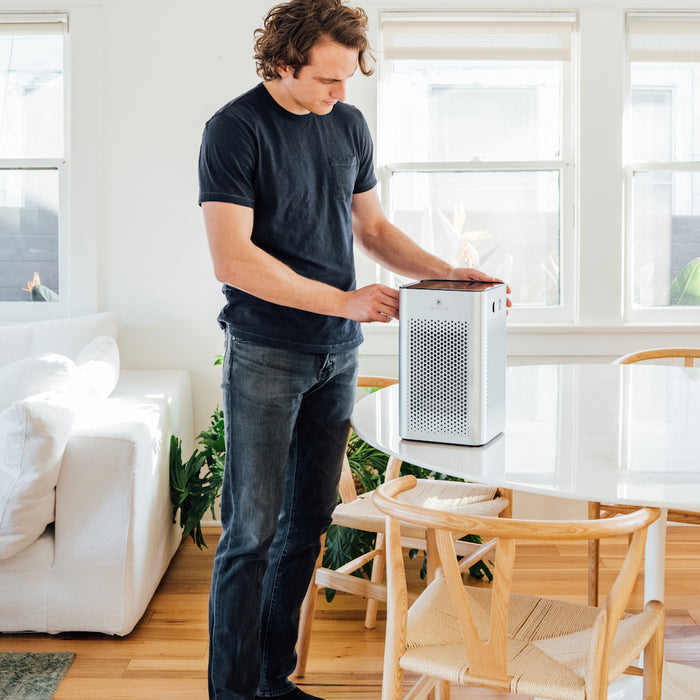 White rectangular ma-25 air purifier with a perforated front panel and minimalist design for clean air filtration