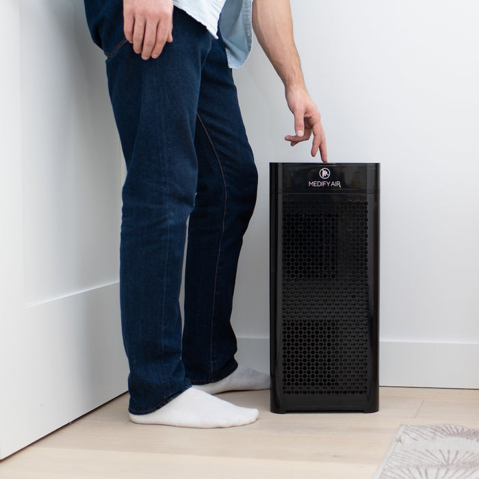 Black medifyair ma-40 air purifier with sleek rectangular design and perforated front panel for clean air filtration