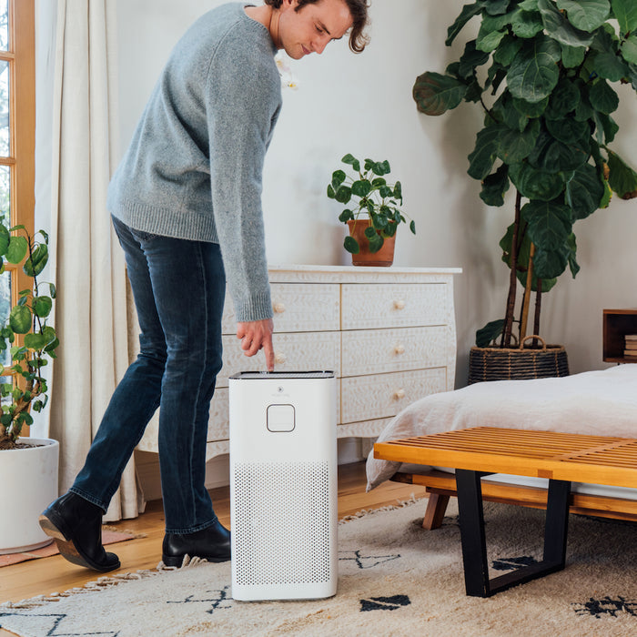 White rectangular ma-50-v3.0 air purifier with perforated lower section and minimalist control panel for clean air