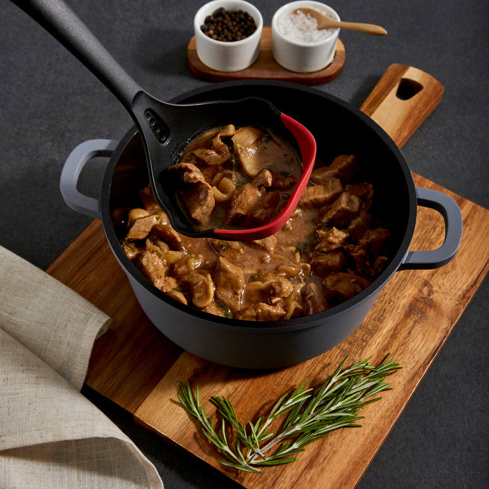 Serving beef stew with a ladle