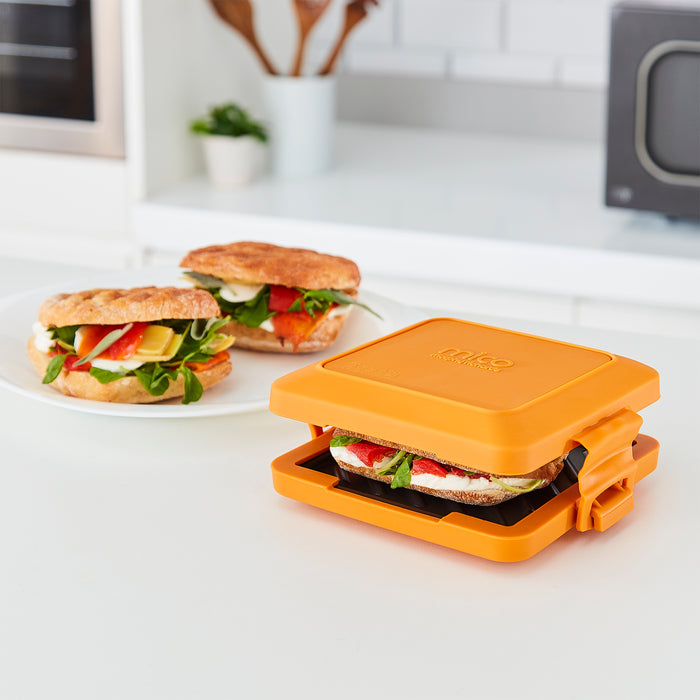 Microwave Toastie Sandwich Maker and Grill with a bagel inside
