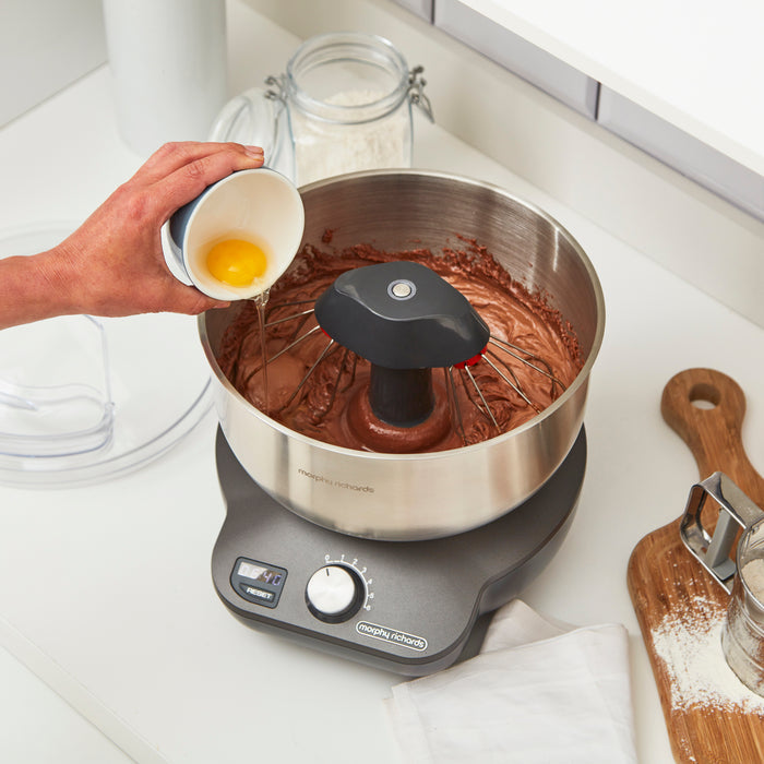 Food mixer making chocolate cake