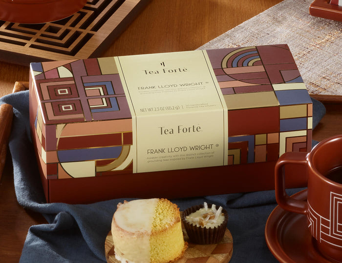 MAIN PDP | Frank Lloyd Wright Presentation Box,  closed on a table with dessert and teacup