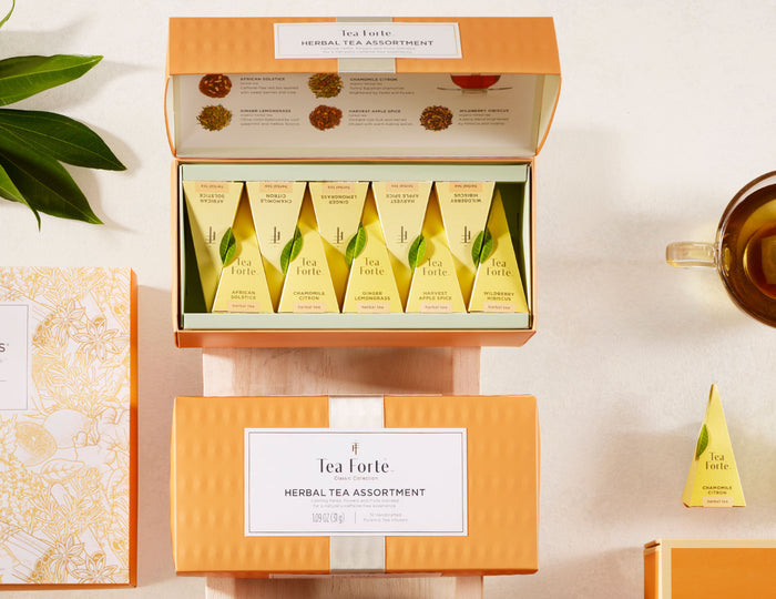 MAIN PDP |  Herbal Presentation Box of 20 teas, shown open and closed with cup and tea and infuser