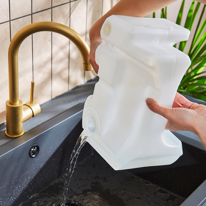 Person filling a water tank