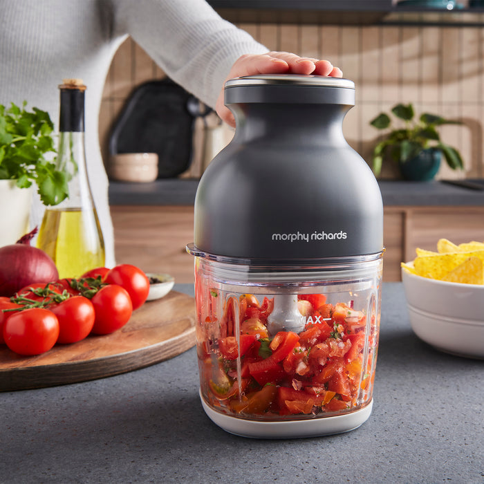 Morphy Richards mini chopper with chopped vegetables on a kitchen counter