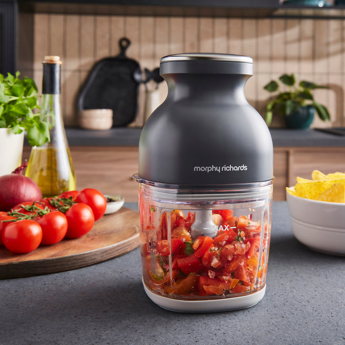 Morphy Richards mini chopper with chopped vegetables on a kitchen counter