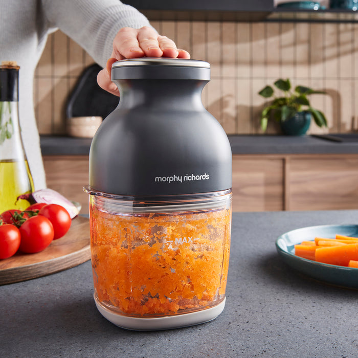 Morphy Richards chopper on a kitchen counter with ingredients around